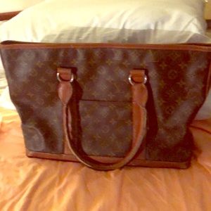Used Louis Vuitton tote bag.